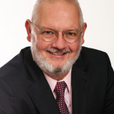 Lars Kairies Mann mit Brille und Bart