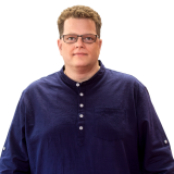 Kandidat Lars Büttner, frontal mit Blauen Hemd