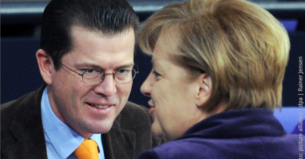 Karl-Theodor zu Guttenberg, Angela Merkel (Foto: picture alliance / dpa | Rainer Jensen)