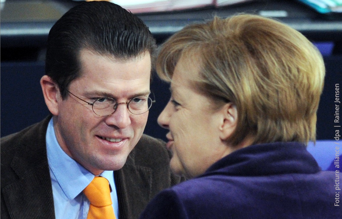 Karl-Theodor zu Guttenberg, Angela Merkel (Foto: picture alliance / dpa | Rainer Jensen)